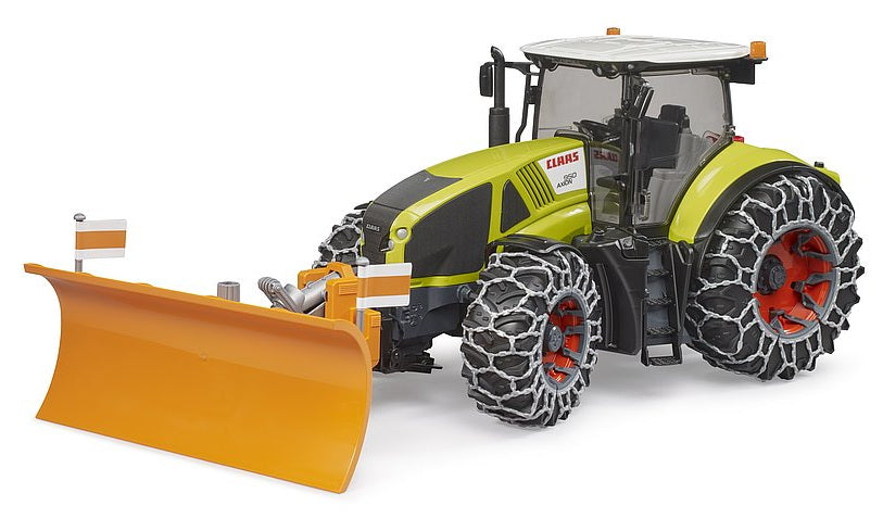 Claas Axion 950 avec chaines à neige et pelle
